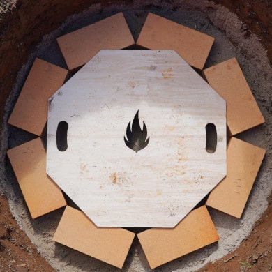 Bauanleitung Feuerstelle bauen: 2. Reihe Schamottsteine mauern